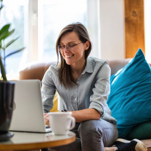 Young woman using a laptop at home