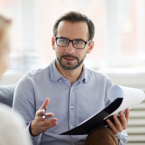 Patient speaking with counselor.